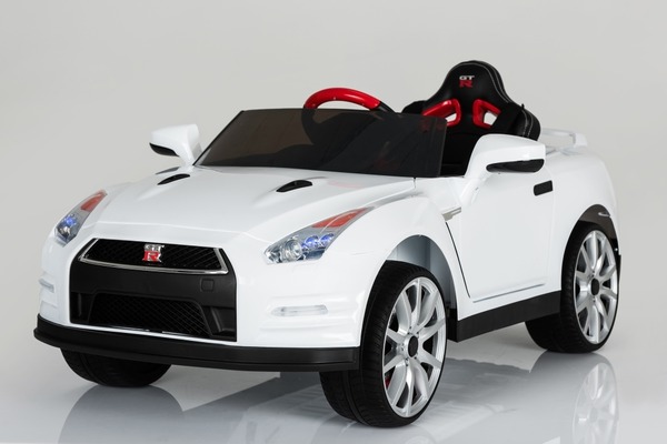 Електромобіль T-797 Nissan GT-R WHITE легковая на р.у. 12V7AH мотор 2*35W с MP3 121*61*36 ш.к. /1/